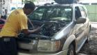 PHOTO: Car trouble, Mechanic working on it