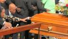 PHOTO: Haiti Funeral - President Michel Martelly first lady Sophia touching the casket of rapper BLACK ALEX