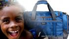 PHOTO: Haitian Child and a Travel Bag