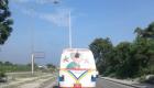 PHOTO: Haiti Transport Bus with Tonton Bicha Portrait on the Back