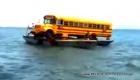 Believe it or Not! - Haiti : A School Bus being transported in the Ocean on two tiny boats (VIDEO)