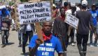 Haiti PetroCaribe street protest sign: Give the money before things get worse