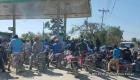 Gas shortage in Haiti - Motorcycles line up for some Gasoline