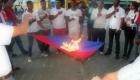Dominicans burning the Haitian Flag / Dominicain ap boule drapo Haitien