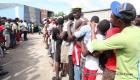 PHOTO: Haiti - Flooding in Cap Haitien - Flood victims in line for government assistance...